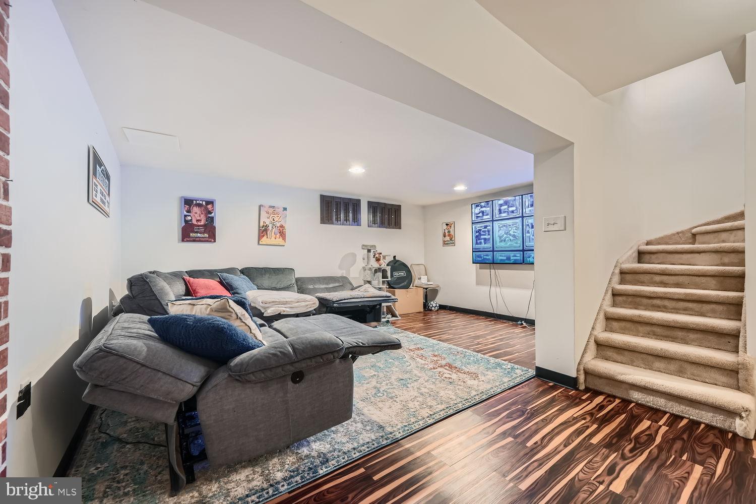5435 King Arthur Circle Rosedale, MD 21237 - Photo 23 of 28 Cozy basement retreat with modern flair.