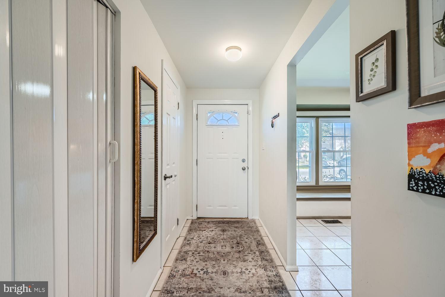 5435 King Arthur Circle Rosedale, MD 21237 - Photo 5 of 28 Inviting entryway with natural light.
