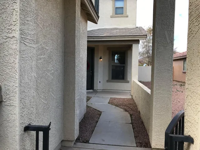 a view of bedroom with a bed and a fireplace