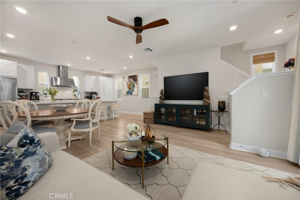 26 Crown Point Drive Rancho Mission Viejo, CA 92694 - Photo 13 of 42 a living room with furniture and a flat screen tv