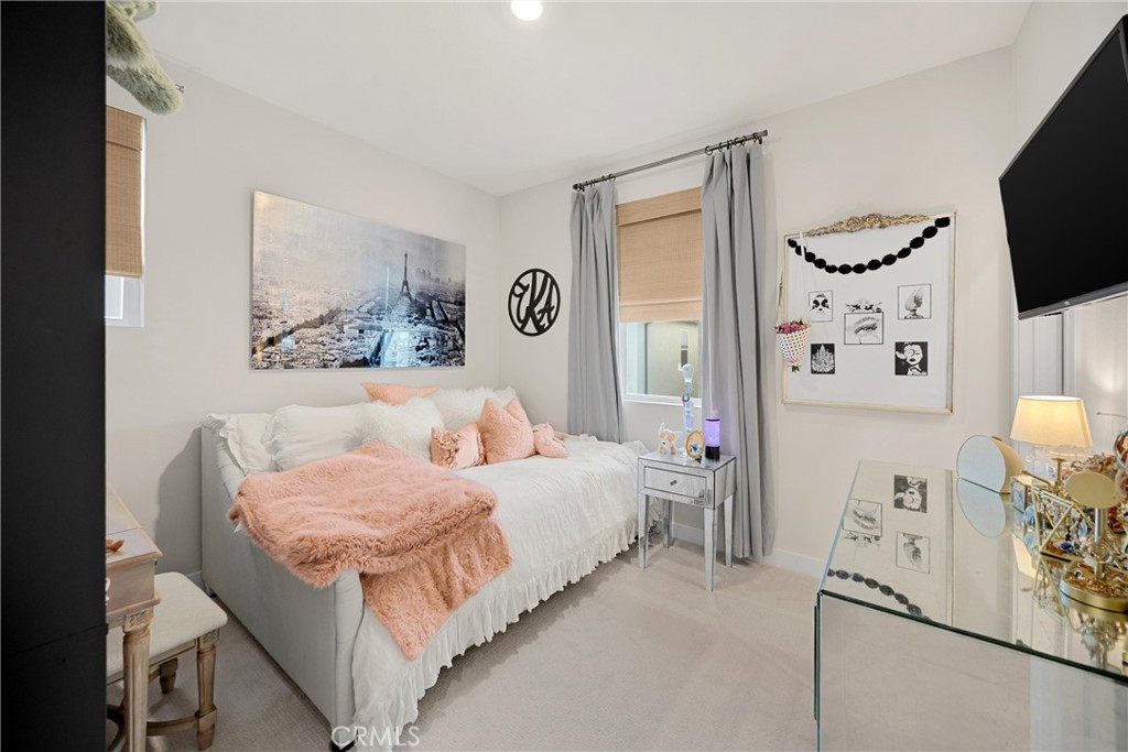 26 Crown Point Drive Rancho Mission Viejo, CA 92694 - Photo 21 of 42 a bedroom with a bed and a flat screen tv