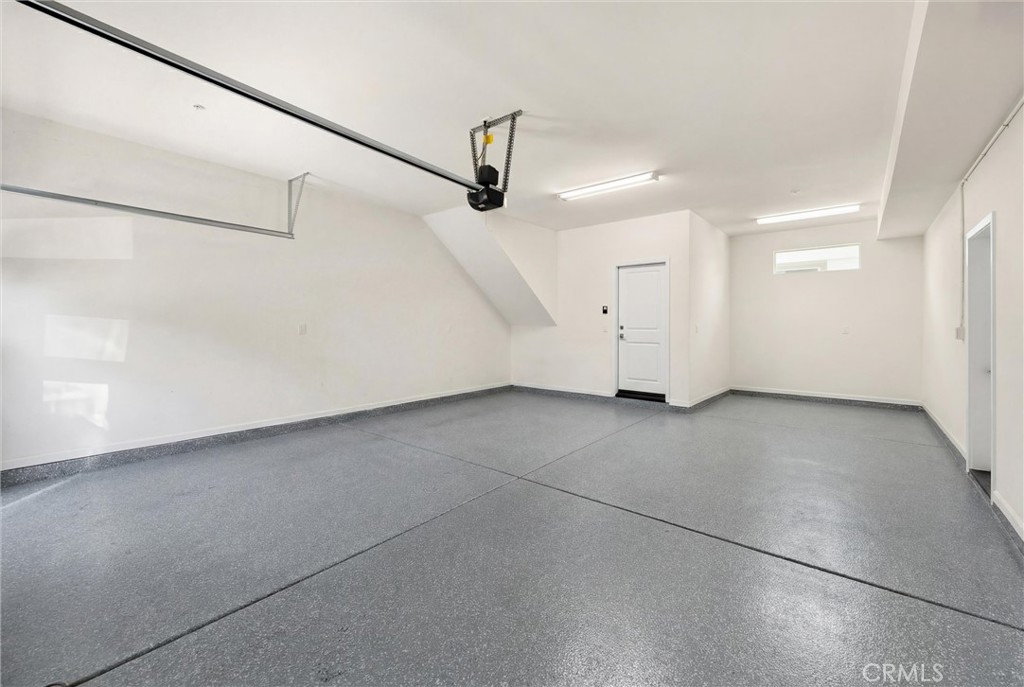 26 Crown Point Drive Rancho Mission Viejo, CA 92694 - Photo 26 of 42 a view of a garage