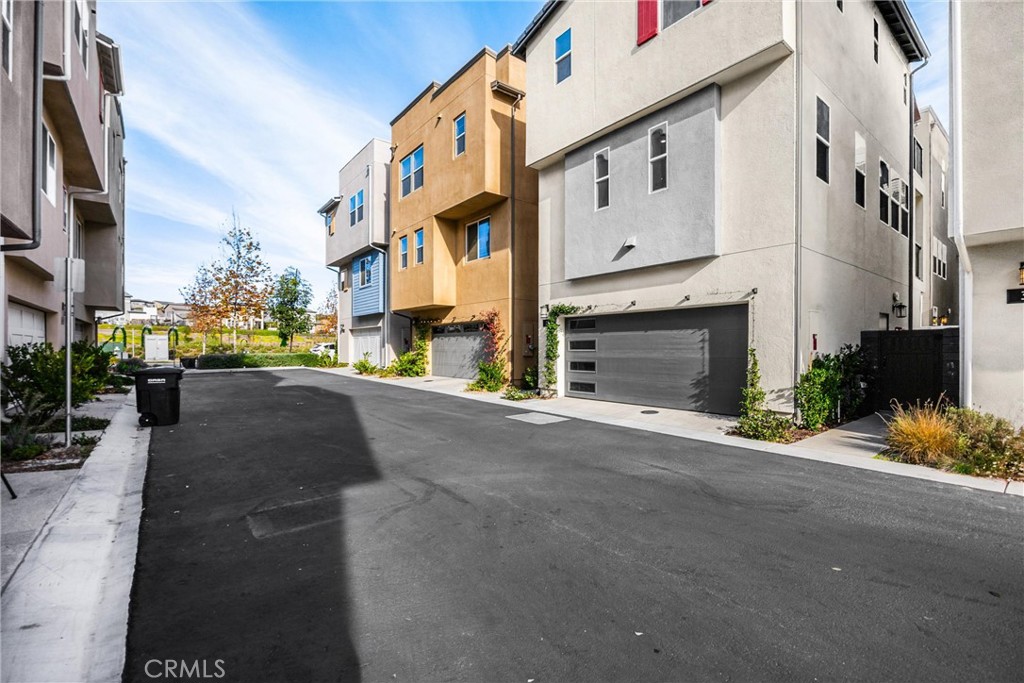 26 Crown Point Drive Rancho Mission Viejo, CA 92694 - Photo 39 of 42 a view of a street with buildings