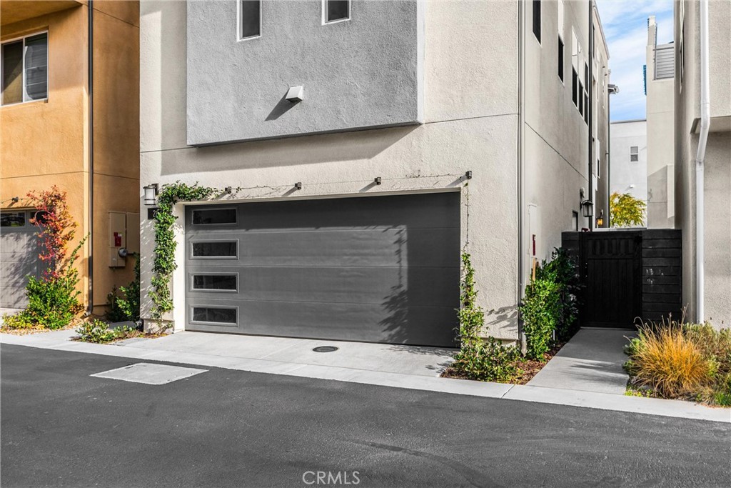 26 Crown Point Drive Rancho Mission Viejo, CA 92694 - Photo 41 of 42 a front view of a house with a garden