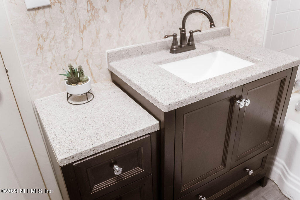 762 North Walnut Street Starke, FL 32091 - Photo 26 of 38 a close view of a sink a counter and utility room