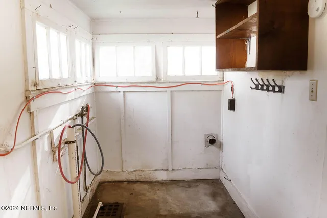 a view of a kitchen with a window