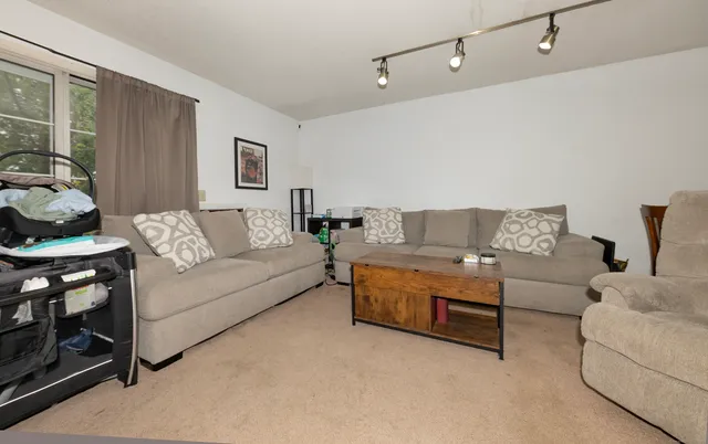 a living room with furniture and a couch