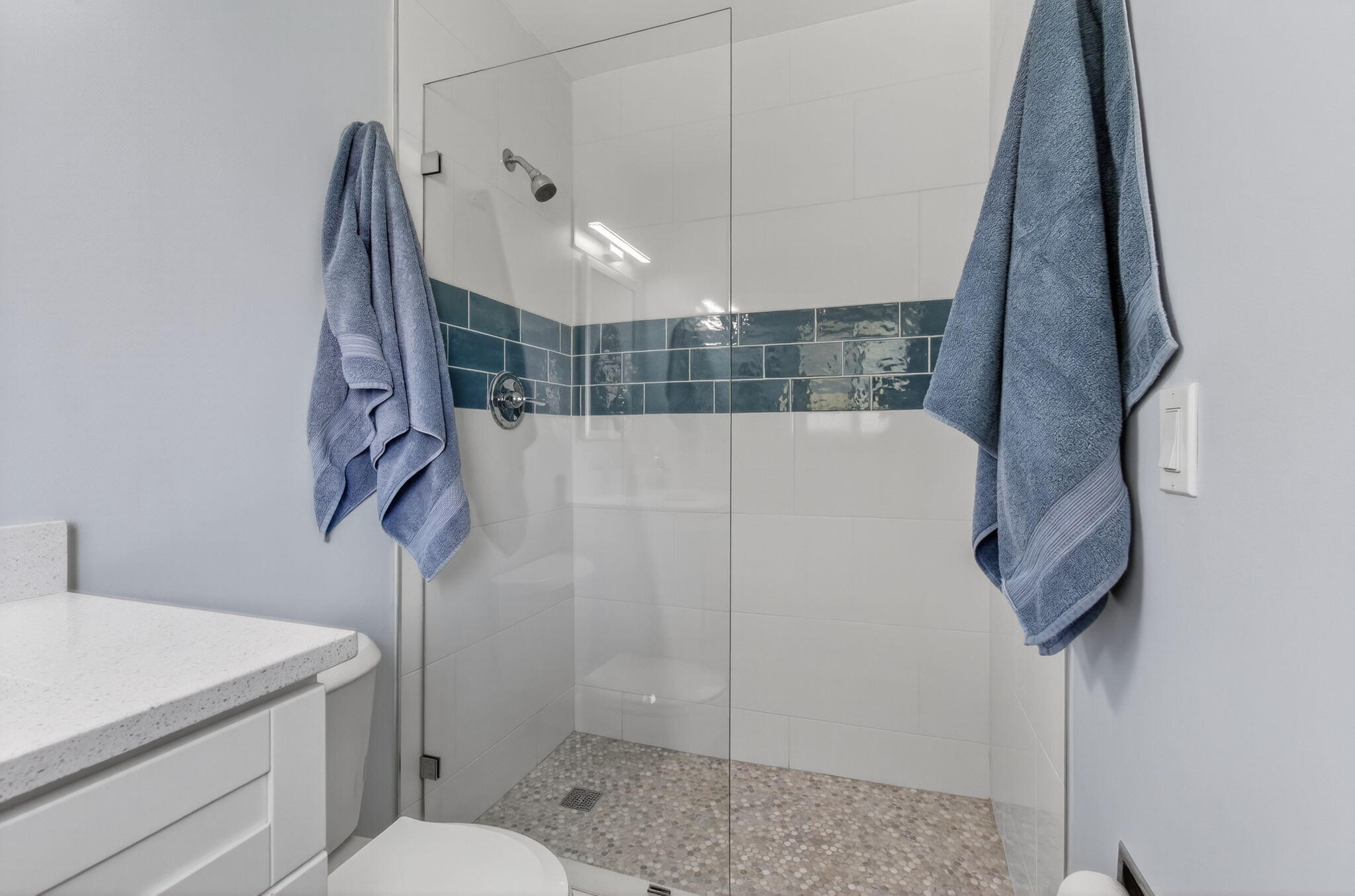 632 Hummingbird Lane Delray Beach, FL 33445 - Photo 45 of 60 a bathroom with a shower and a sink