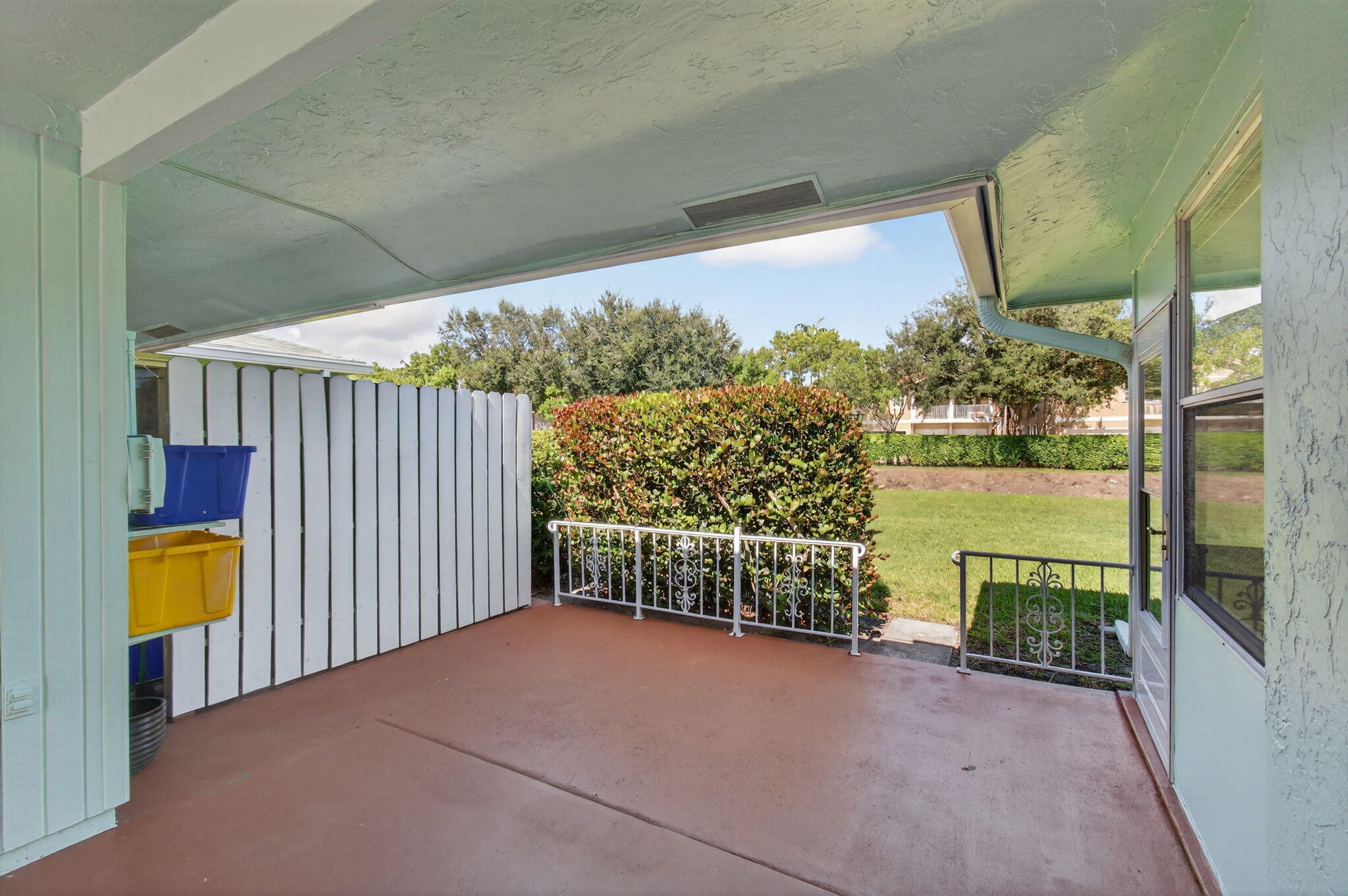 632 Hummingbird Lane Delray Beach, FL 33445 - Photo 51 of 60 a view of a porch