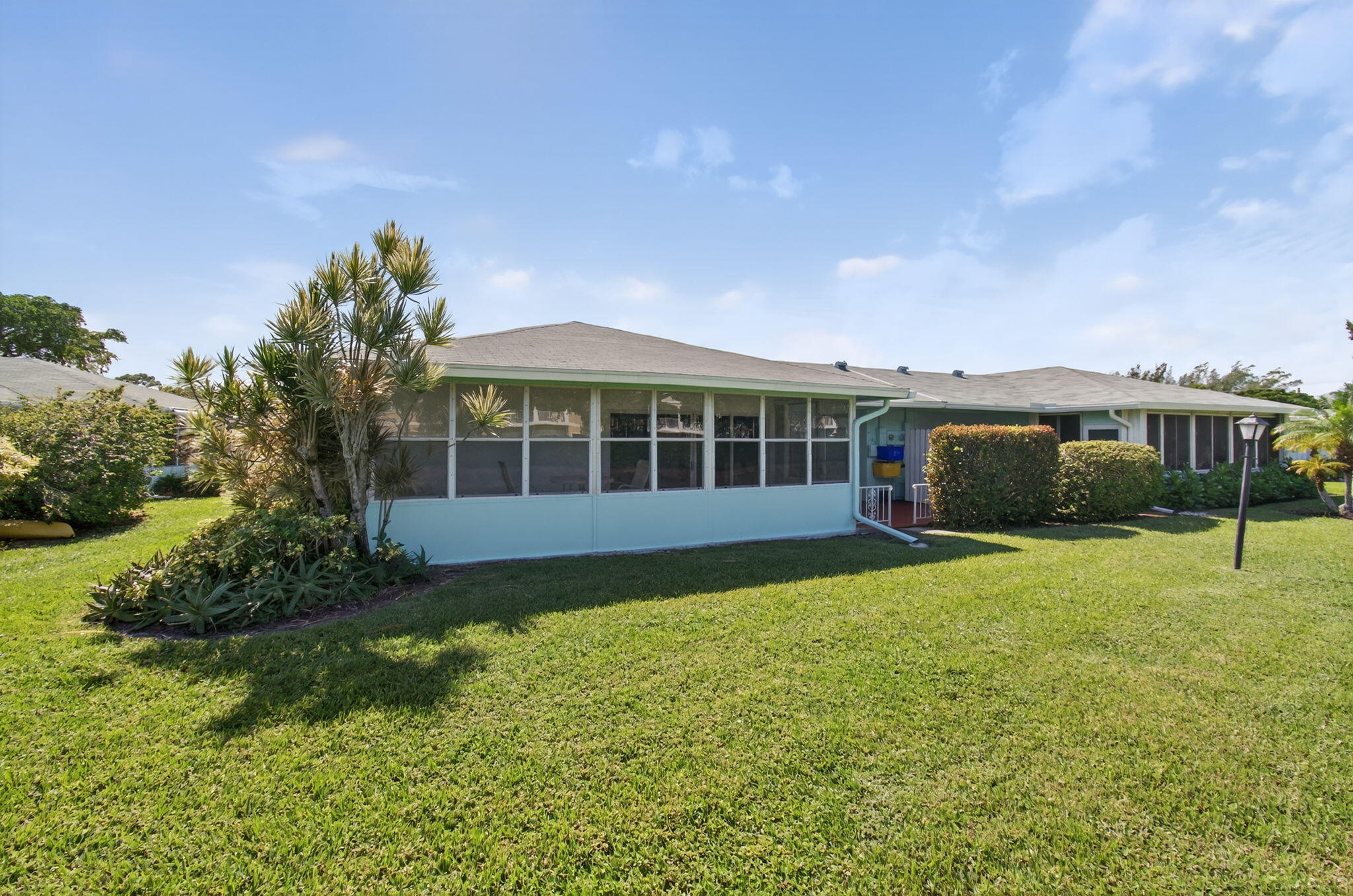 632 Hummingbird Lane Delray Beach, FL 33445 - Photo 55 of 60 a view of a house with a backyard