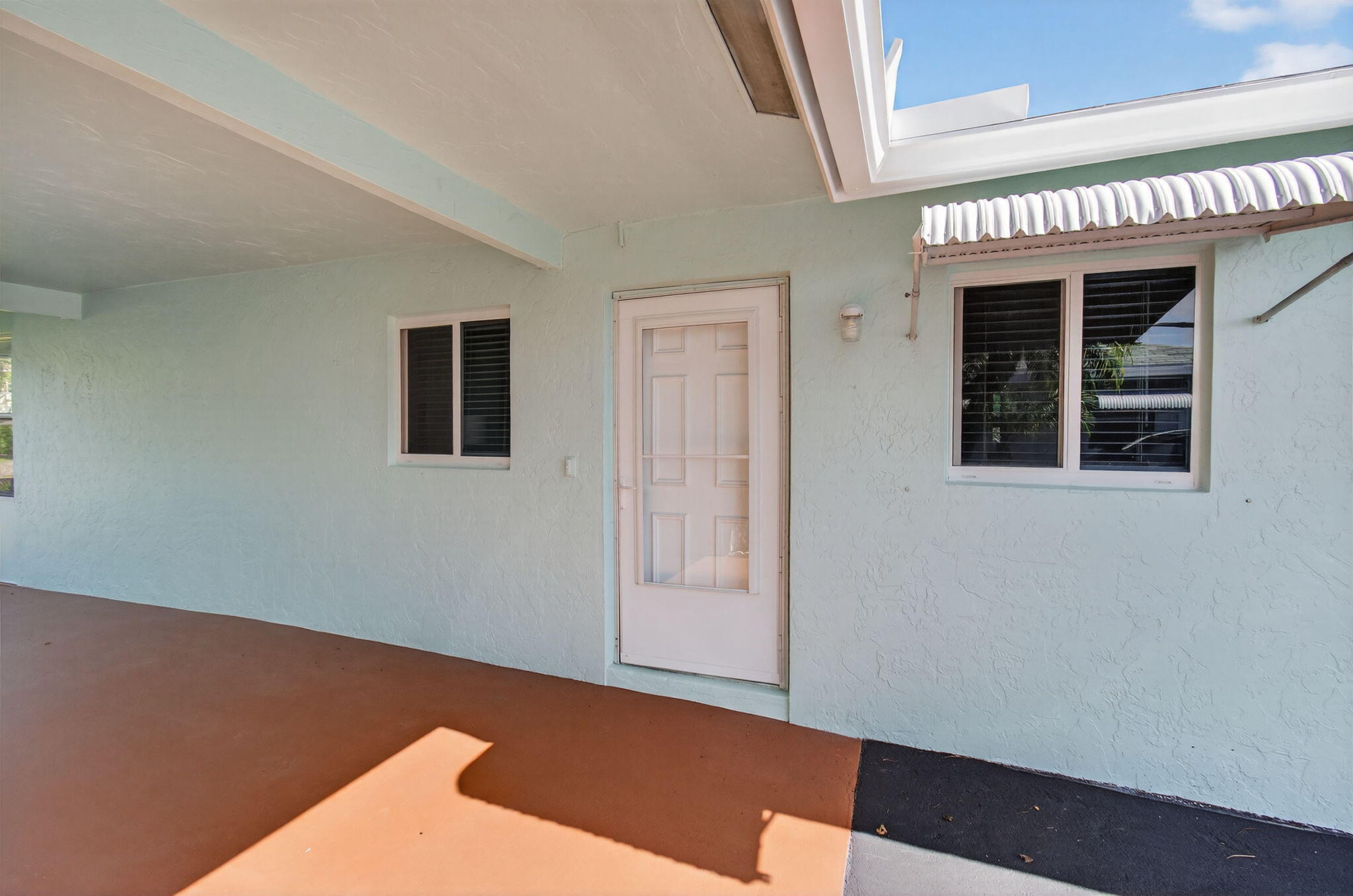632 Hummingbird Lane Delray Beach, FL 33445 - Photo 7 of 60 a view of an empty room with wooden floor