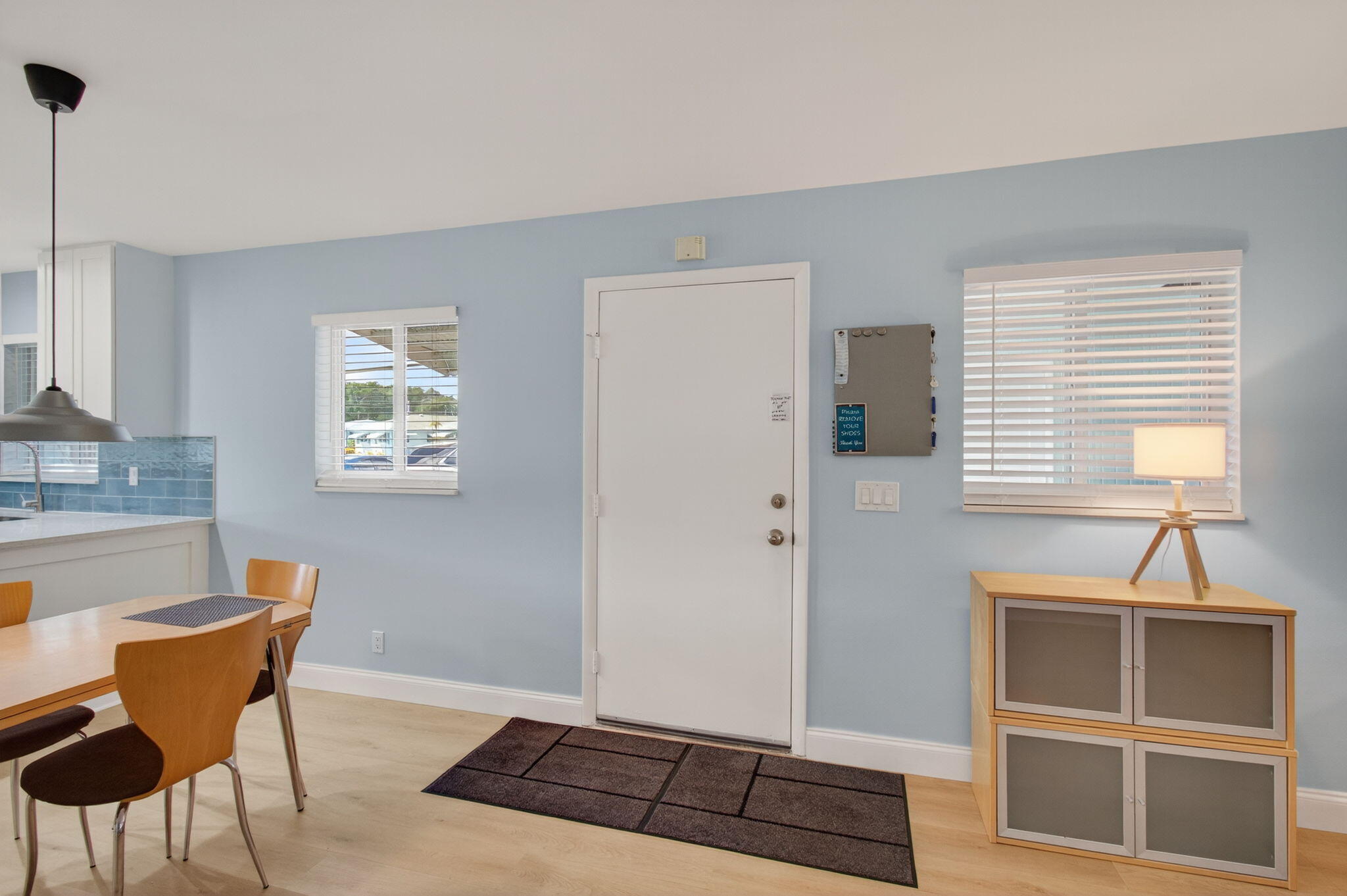 632 Hummingbird Lane Delray Beach, FL 33445 - Photo 8 of 60 a living room with a couch and a window