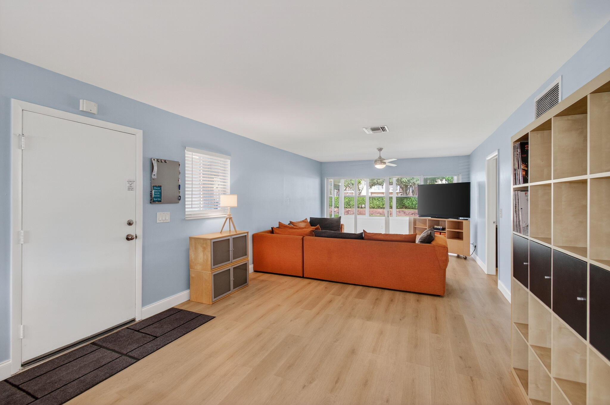 632 Hummingbird Lane Delray Beach, FL 33445 - Photo 10 of 60 a large living room with a large window