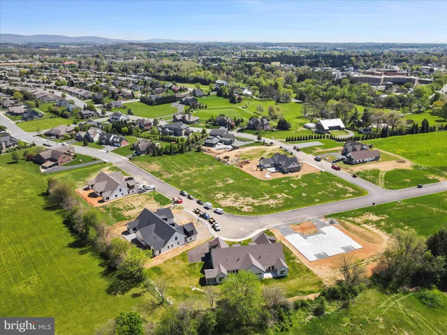 an aerial view of a city with lots of residential buildings