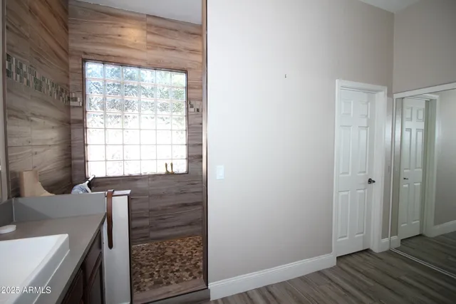 a room with window and wooden floor
