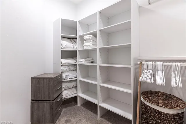 a room with a furniture and a window