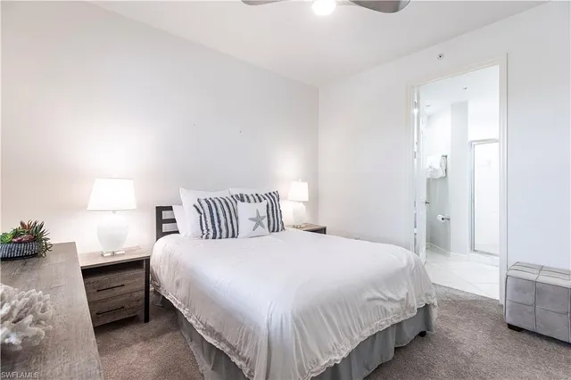 a bedroom with a bed and a cabinets