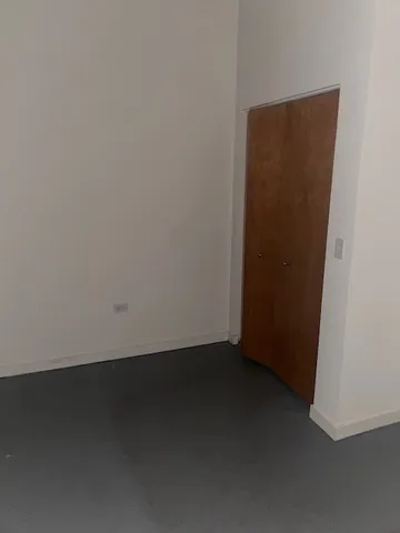 an empty room with a door