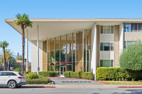 a car parked in front of a house