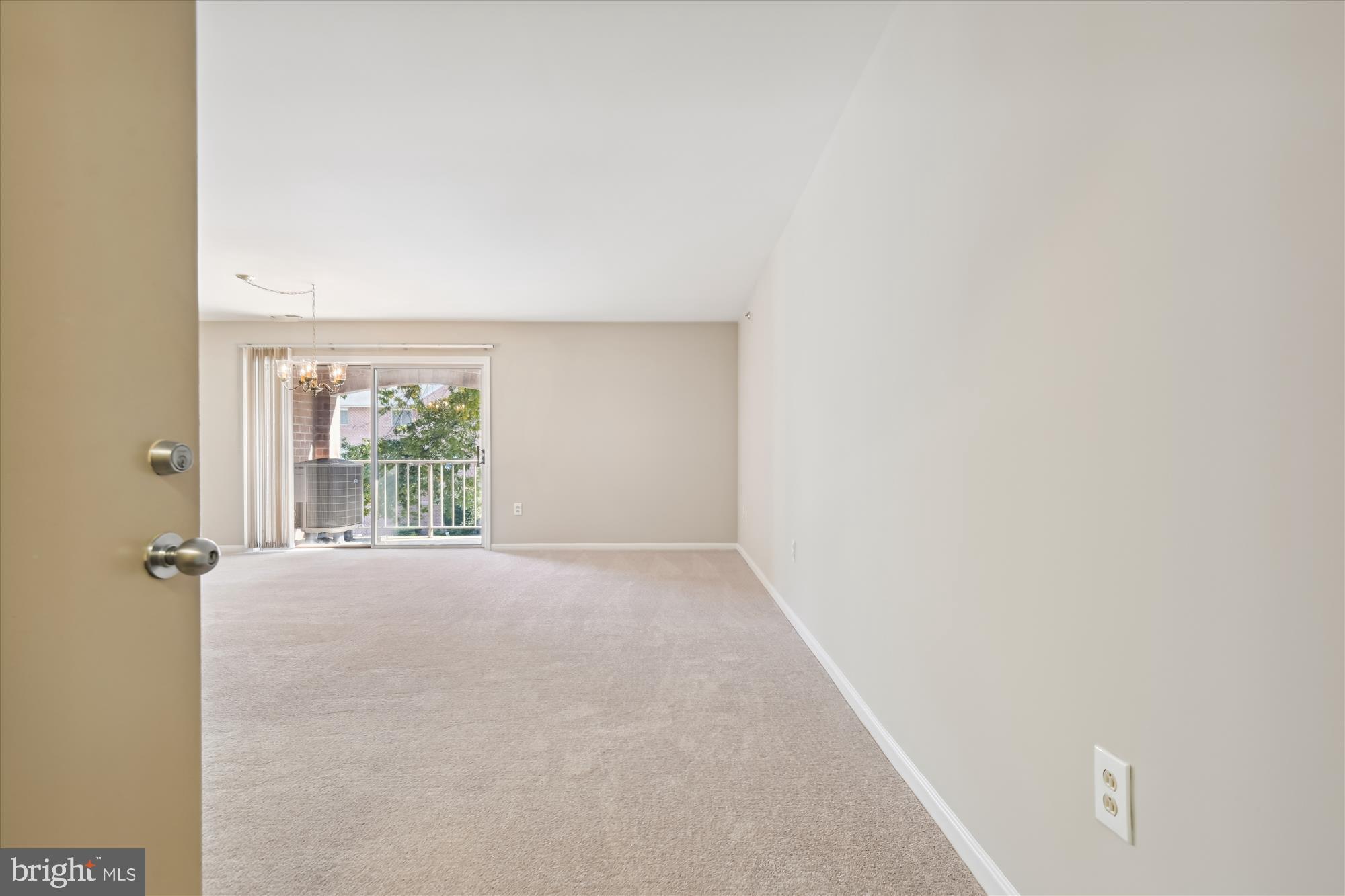 4104 Chardel Road, Unit 1E Nottingham, MD 21236 - Photo 3 of 33 And welcome to #1E, walking in - living room