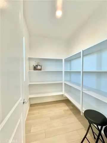 a room with a book shelf