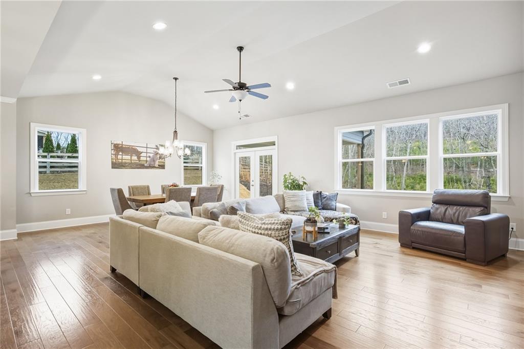 265 Fountain Oak Way Canton, GA 30114 - Photo 19 of 59 a living room with furniture window and wooden floor