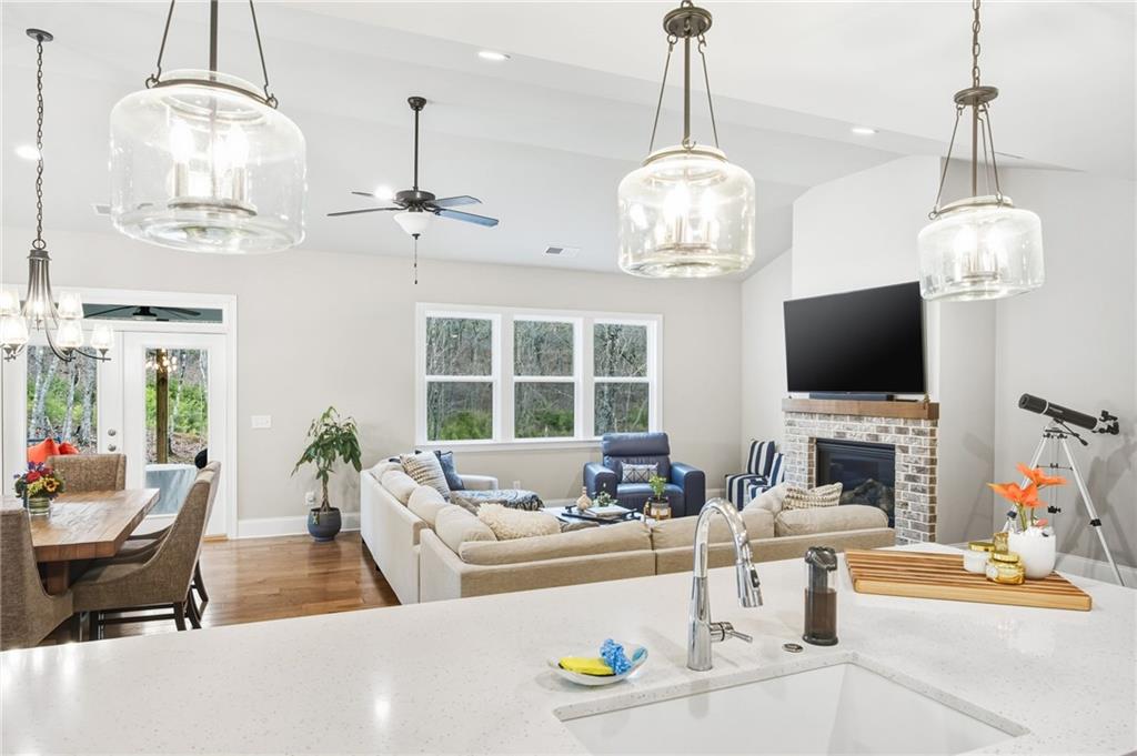 265 Fountain Oak Way Canton, GA 30114 - Photo 20 of 59 a living room with fireplace furniture and a flat screen tv