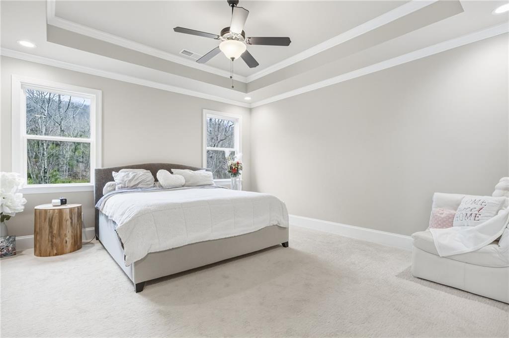 265 Fountain Oak Way Canton, GA 30114 - Photo 25 of 59 a bedroom with a bed rug and window