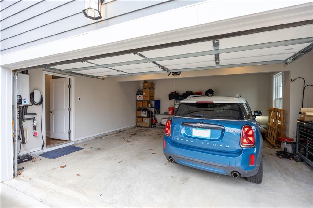 265 Fountain Oak Way Canton, GA 30114 - Photo 45 of 59 a car parked in garage