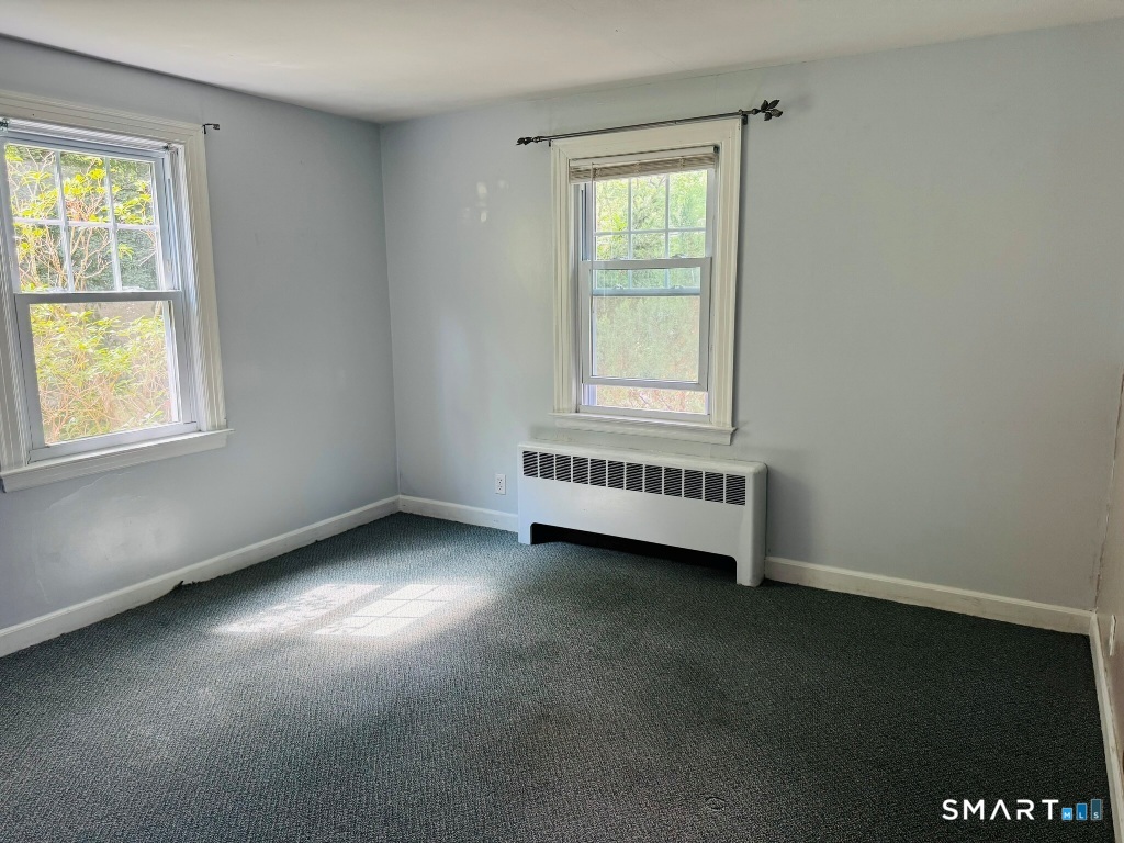 1507 Woodtick Road Wolcott, CT 06716 - Photo 9 of 19 Main level bedroom