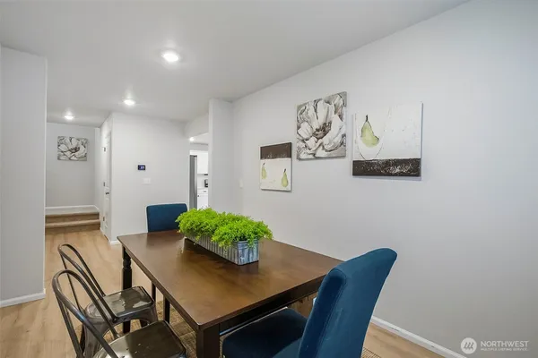 a view of a dining room with furniture