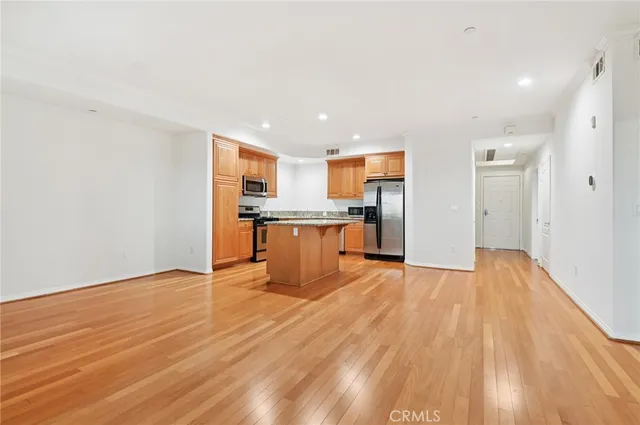 a view of kitchen with wooden floor
