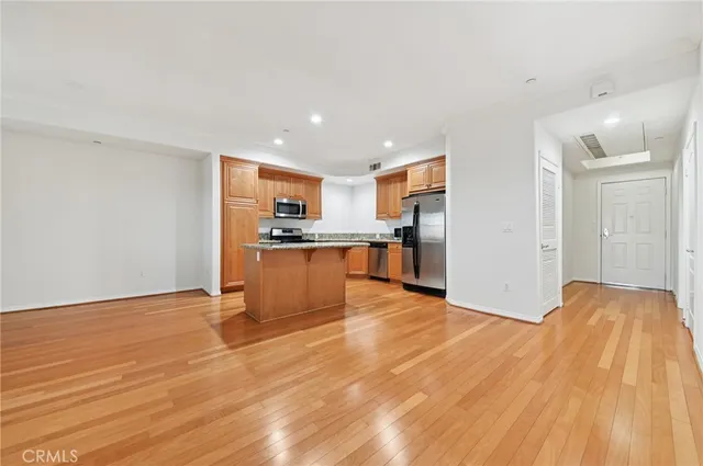 a view of kitchen with wooden floor