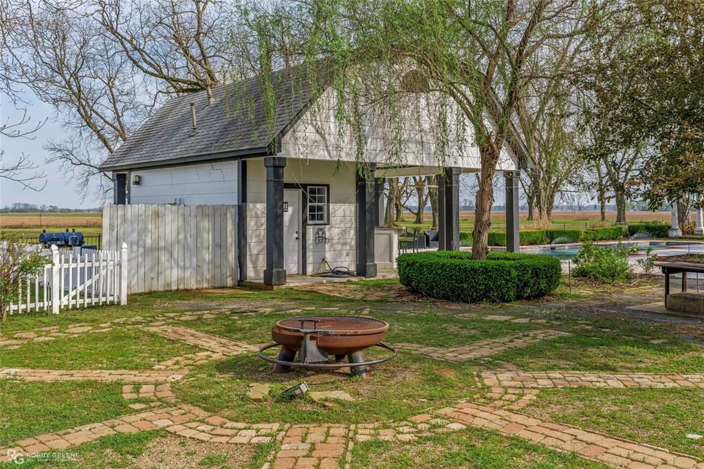 8265 Cornhusker Road Shreveport, LA 71107 - Photo 11 of 39 a view of a house with backyard and sitting area