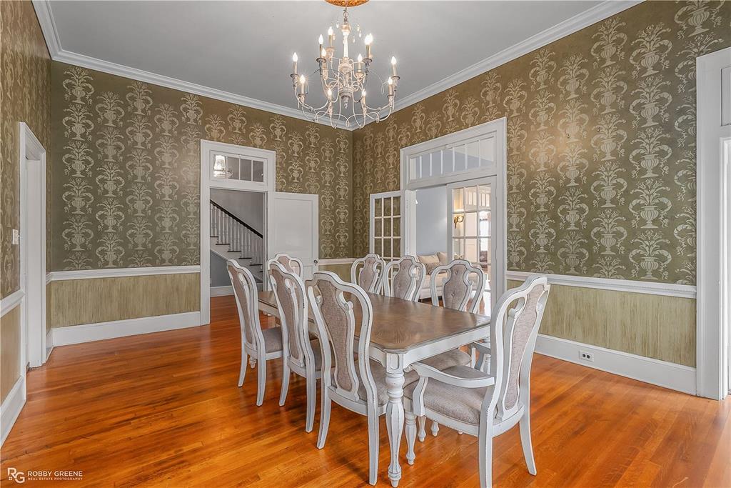 8265 Cornhusker Road Shreveport, LA 71107 - Photo 14 of 39 a view of a dining room with furniture window and wooden floor