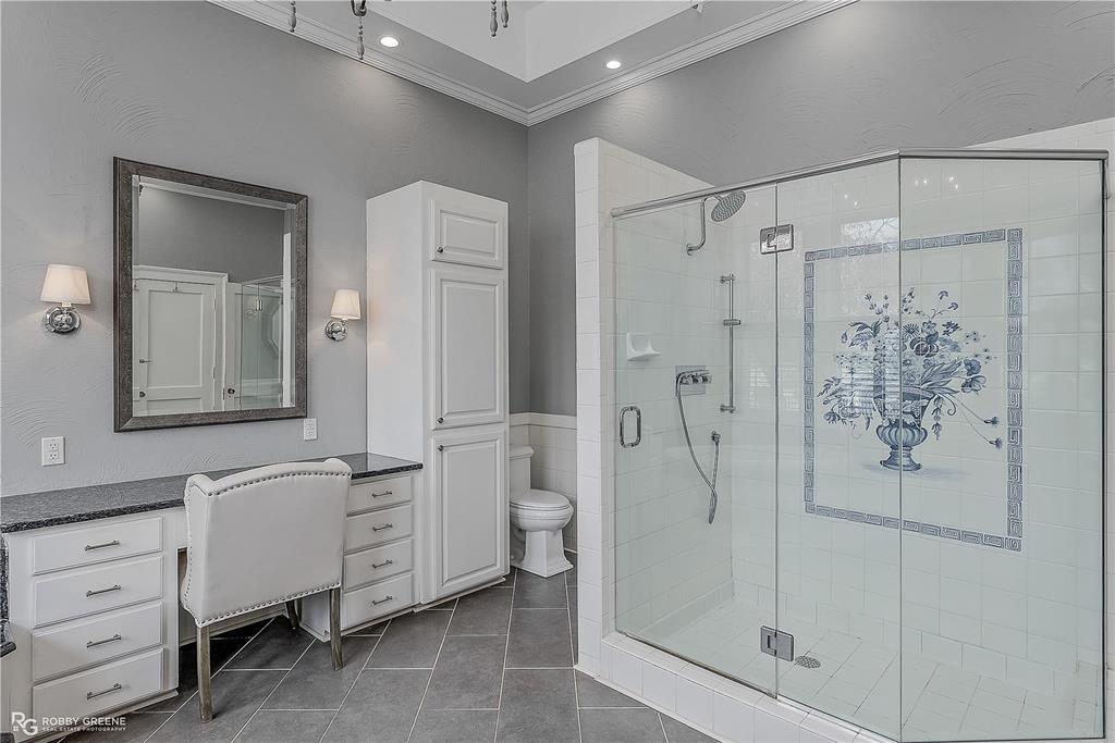 8265 Cornhusker Road Shreveport, LA 71107 - Photo 21 of 39 a bathroom with a shower sink and mirror