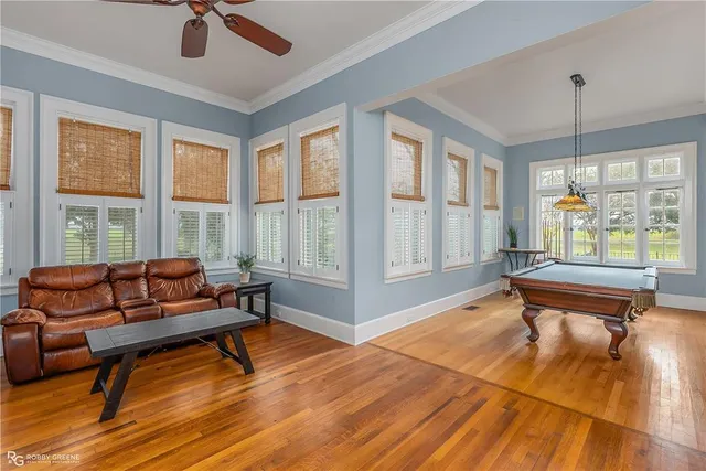 a living room with furniture and a window