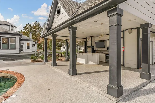 a view of a building with a floor to ceiling window and a basket ball poll