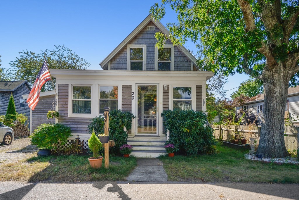 front view of a house with a yard