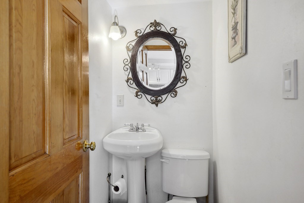 20 13th Street Wareham, MA 02558 - Photo 14 of 30 a bathroom with a sink and a mirror