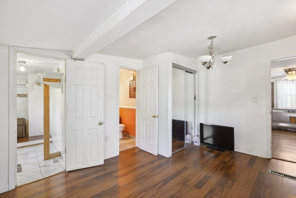 20 13th Street Wareham, MA 02558 - Photo 24 of 30 a view of a livingroom with wooden floor and a flat screen tv