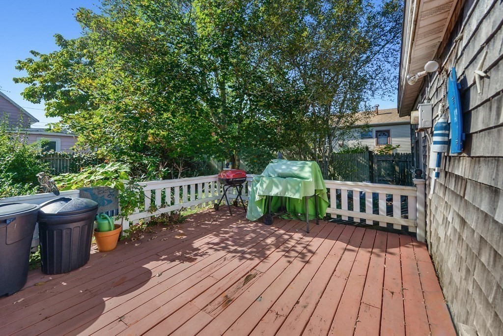 20 13th Street Wareham, MA 02558 - Photo 28 of 30 a view of a deck with wooden floor and fence with a garden