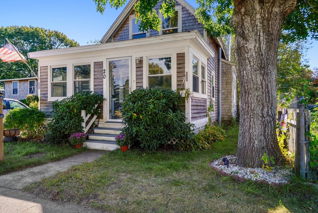 20 13th Street Wareham, MA 02558 - Photo 3 of 30 a front view of a house with a yard