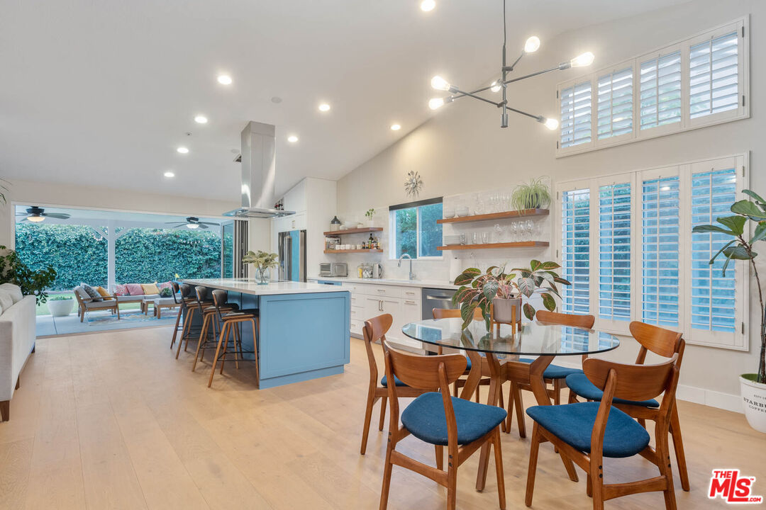 1220 Dincara Road Burbank, CA 91506 - Photo 2 of 33 a view of a dining room with furniture and chandelier