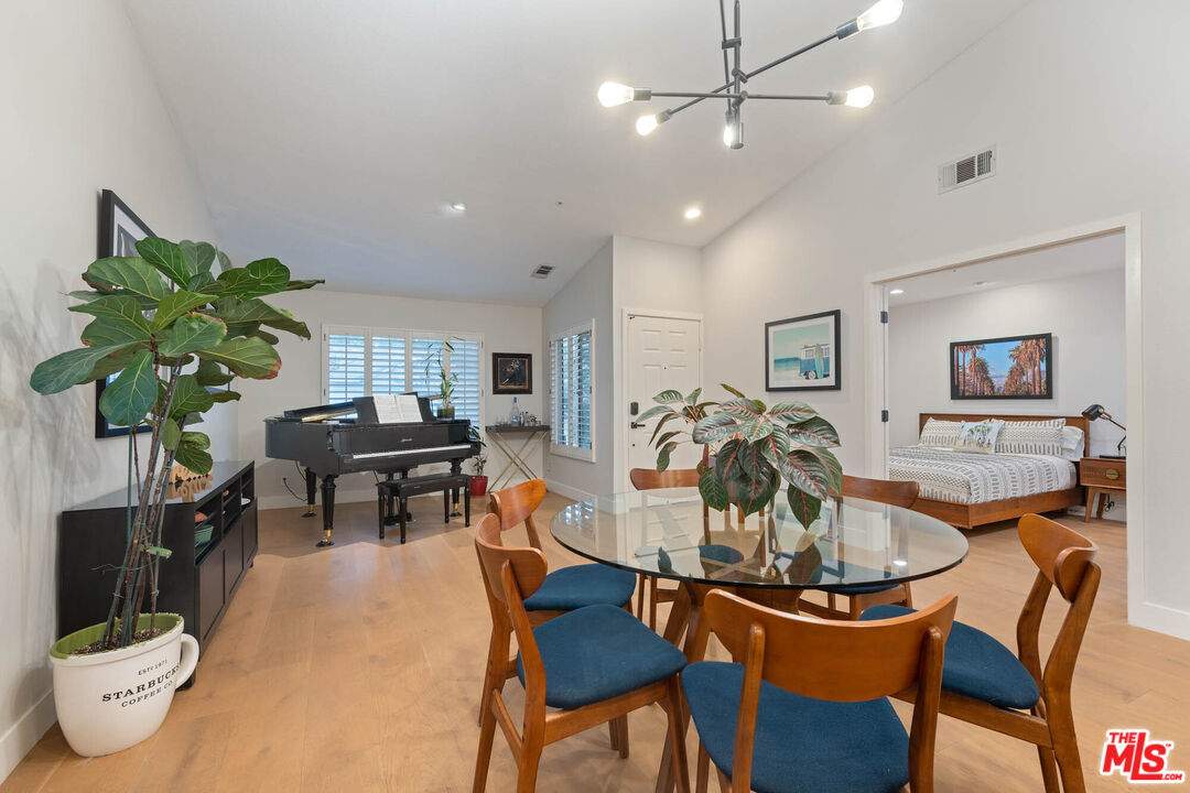 1220 Dincara Road Burbank, CA 91506 - Photo 6 of 33 a dining room with furniture and a potted plant