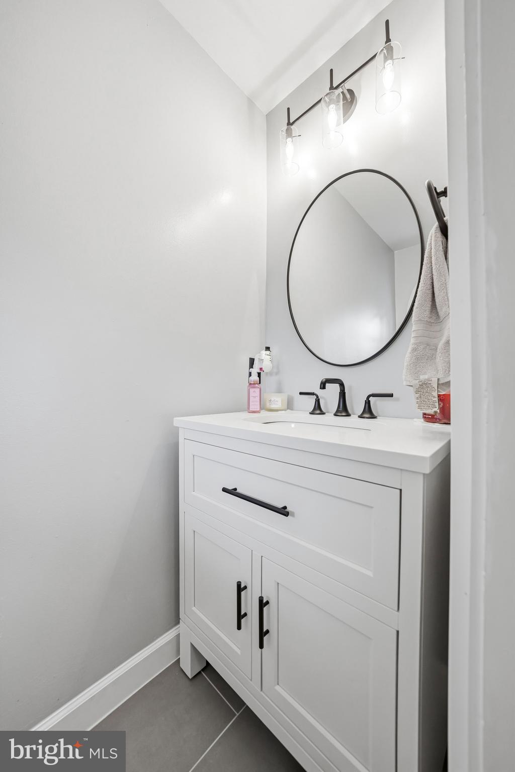 7 Watson Drive Mount Laurel, NJ 08054 - Photo 22 of 42 a bathroom with a sink and a mirror