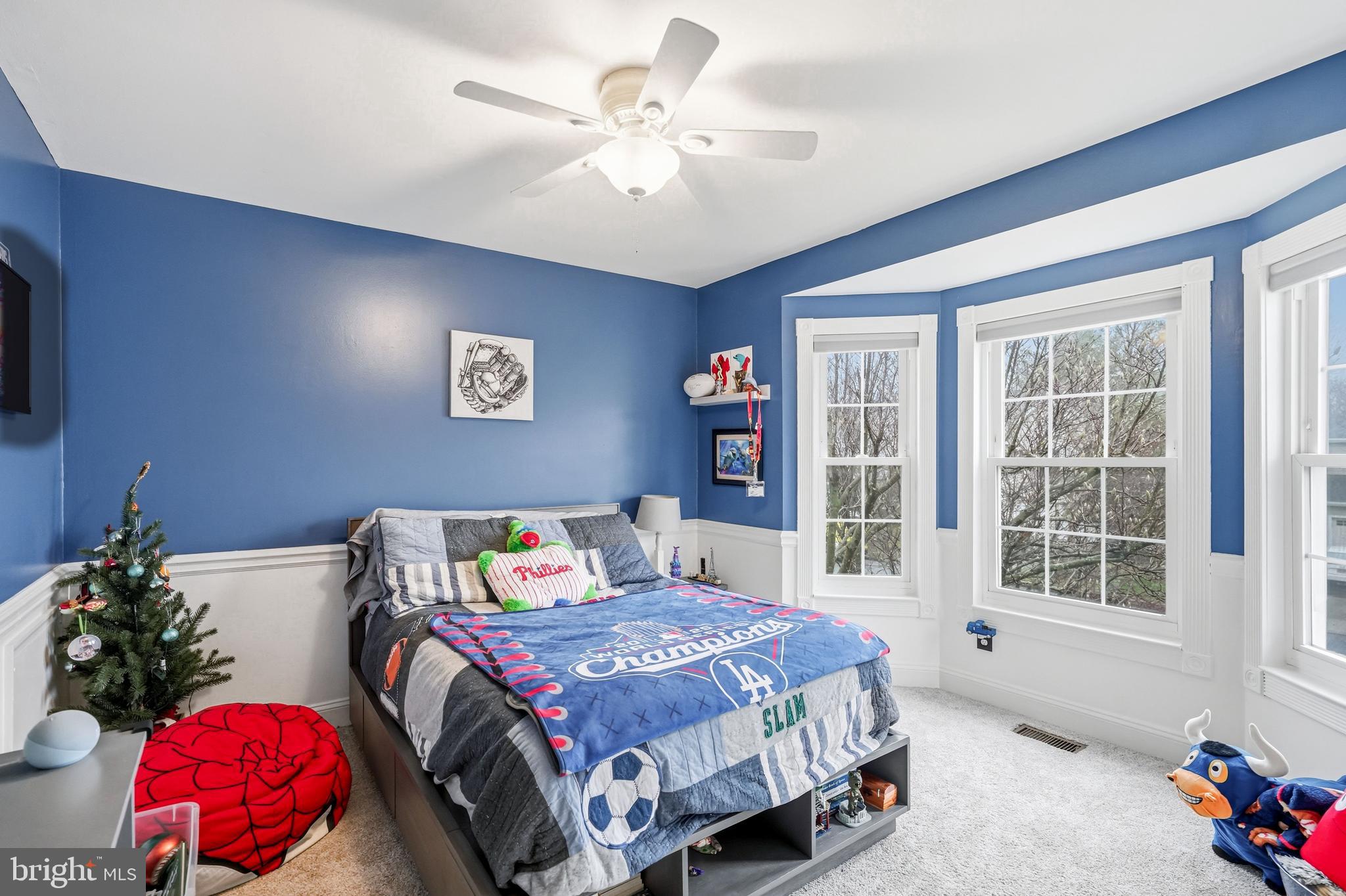 7 Watson Drive Mount Laurel, NJ 08054 - Photo 28 of 42 a bedroom with a bed and a chandelier
