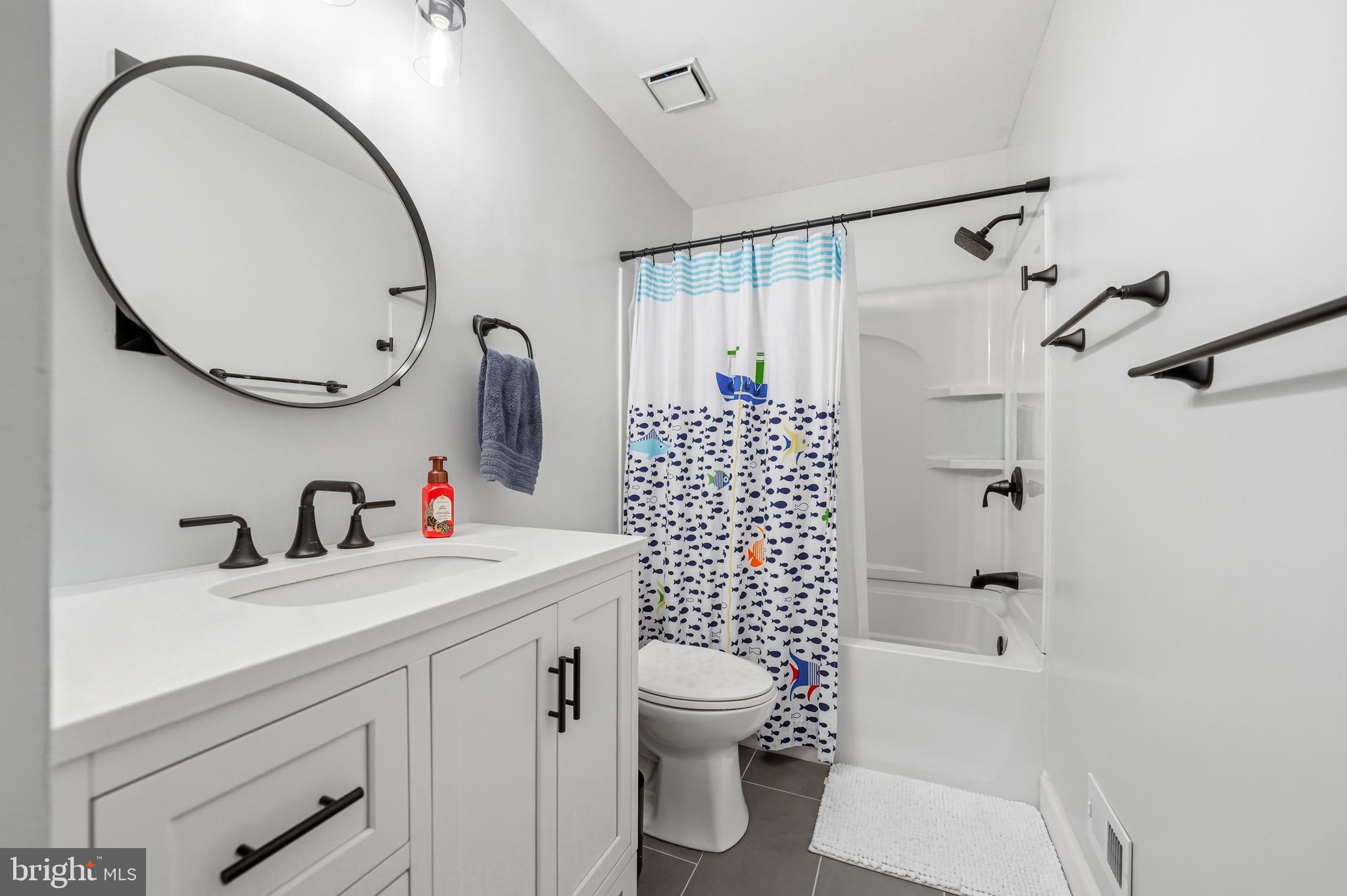 7 Watson Drive Mount Laurel, NJ 08054 - Photo 29 of 42 a bathroom with a sink a toilet and a mirror