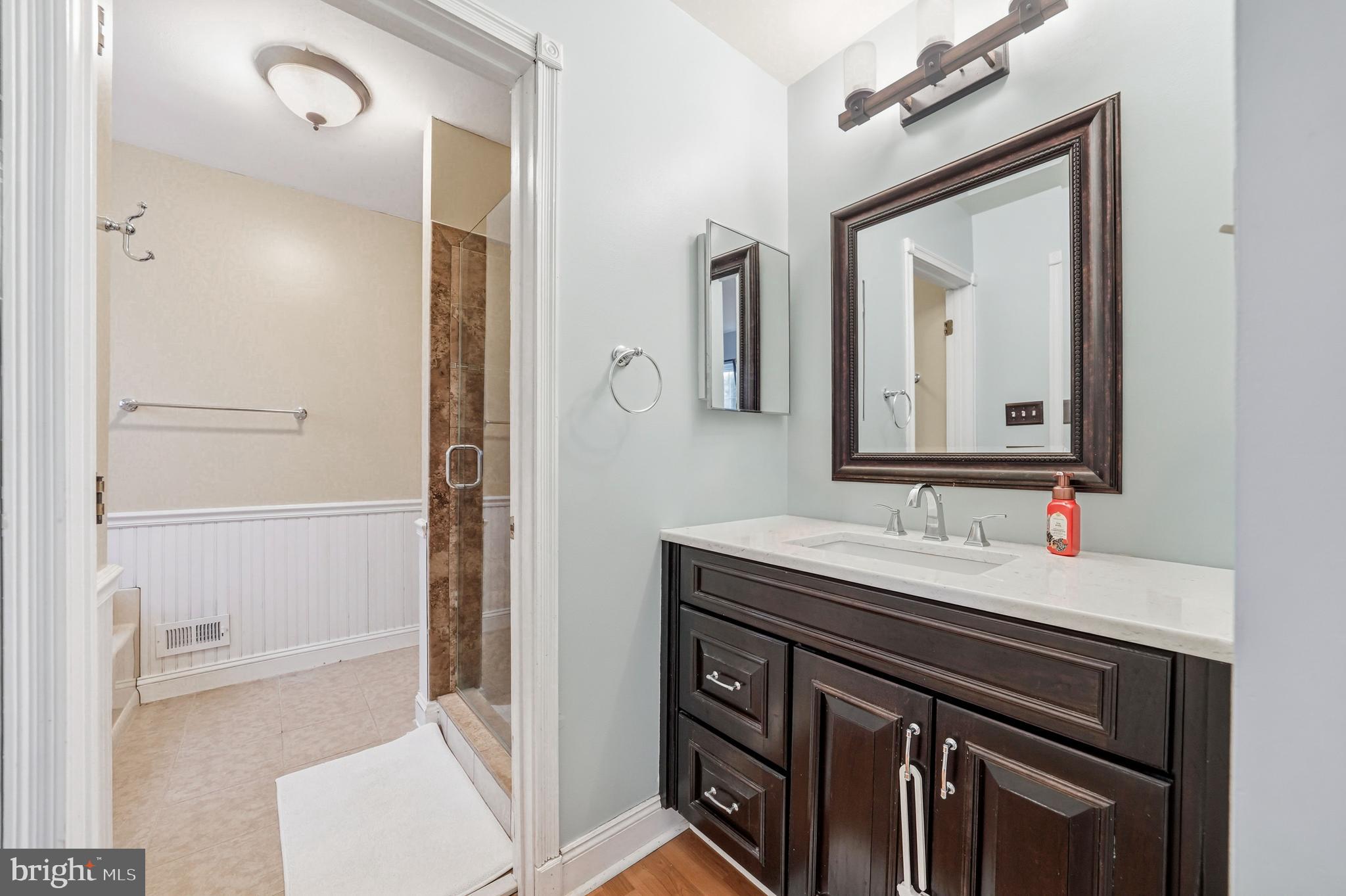 7 Watson Drive Mount Laurel, NJ 08054 - Photo 31 of 42 a bathroom with a sink a vanity and a mirror