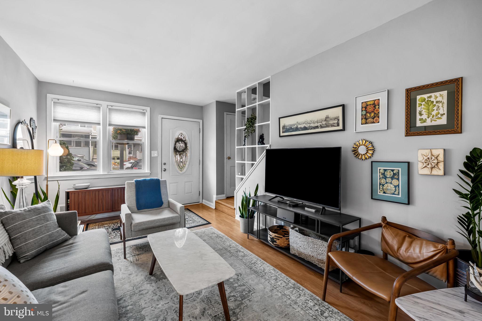 615 West 36th Street Baltimore, MD 21211 - Photo 6 of 29 a living room with furniture and a flat screen tv